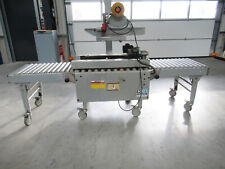 Kartonverschlußmaschine Soco T10 Boden- und Deckelverschluß Soco mit Rollenbahn