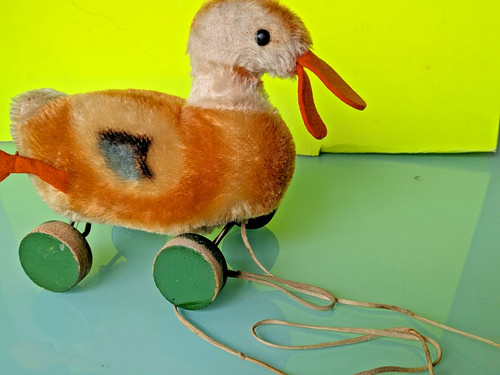 Steiff ente auf - auf, holzrädern