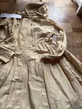 Rundholz Black Label, Mantel