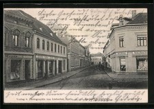 Egeln, Ansichtskarte, Strasse Breite Weg mit Geschäften 1905 