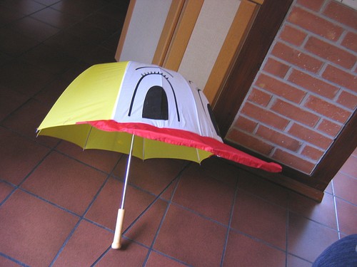 Lustiger regenschirm mit - regenschirm,