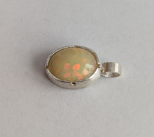Feiner Opal Anhänger in 925 Silber überwiegend intensiv rotes Feuer