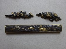 Kozuka und 2 Menuki (Kranich