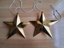 2 goldfarbene Stern zum