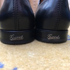 Gucci Leder Schwarz Metall