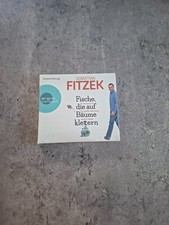 Fische, die auf Bäume