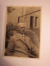 old man with bald head and