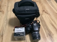 Canon EOS 1000D mit Objektiv Canon EFS 18-55mm + Canon EF 50mm f/1.8 II