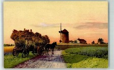 39686984 - Pferdewagen mit Stroh beladen , Muehle Tiergespann