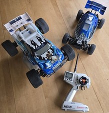 1x Ansmann Elektroauto Truggy oder Buggy und eine Graupner Fernbedienung