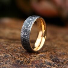 Geschwärzter Ring mit Runen