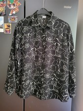 Bluse schwarz -weiß gemustert , Langarm, Marke  Gina G, !00 % Polyester Größe 46