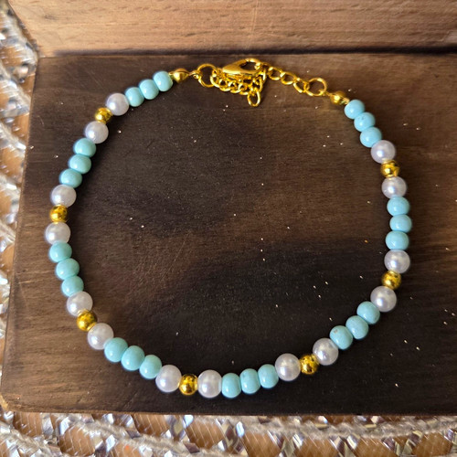 Perlenarmband perlenbesetzt