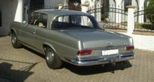 Oldtimer Mercedes W111 280 SE/CP u. a. neuw. Stoßfänger-Chromblende hi. Mitte