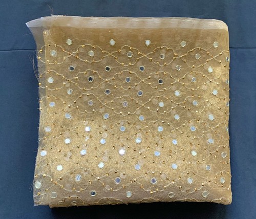 Goldfarbener spitzen stoff mit - goldfarbener, spitzen-stoff