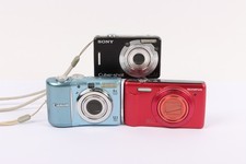 Canon Powershot A1100 IS blue ; Sony Cybershot DSC-W55 ; Olympus VR-350 red