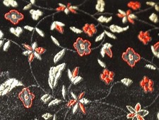 Brokatstoff-Blüten schwarz