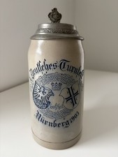 Bierkrug mit Zinndeckel,  X