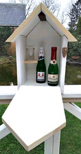 Minibar getarnt als Vogelhaus