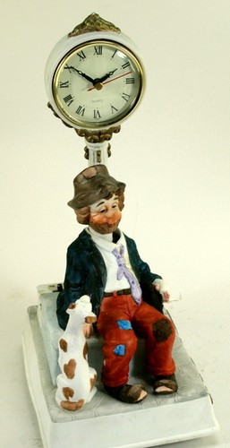 Porzellan figur mit uhr und - porzellan,