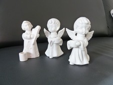 3 weiße Kerzenhalterengel