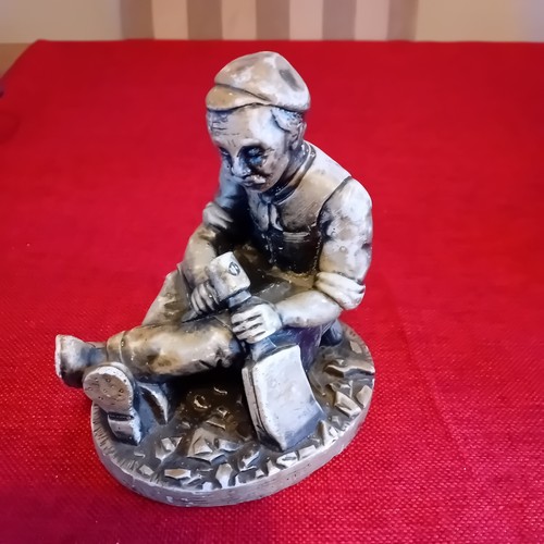 Figur eines steinmetzes auf - eines,