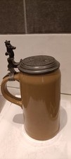 BIERKRUG mit RELIEFDECKEL mit Gams - Drücker, Sportkrug, METTLACH V.B. um 1920