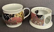 Teetasse und Stövchen aus Porzellan - wenig genutzt