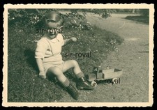 Little Boy with Toy Truck