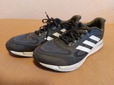 Laufschuhe adidas Supernova + M GX2953 Schwarz in US 12
