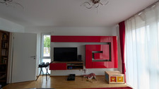 Moderne Wohnwand / Medienwand in Rot Hochglanz
