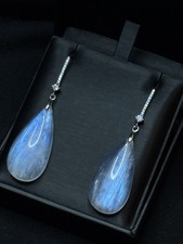 Große Ohrringe natürlicher