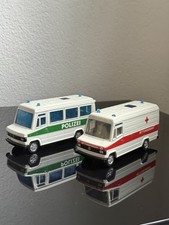 Siku Polizei und Krankenwagen