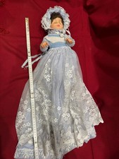 Babypuppe 37 cm mit Wackelaugen und Taufkleid hellblau