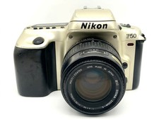 Nikon F50 + Sigma 70-210mm