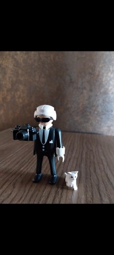 Karl lagerfeld mit eule und - karl,