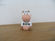 Niedliche Kuh Figur sitzend