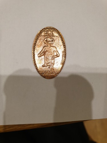 Motive elongated coin t - 1, e.t