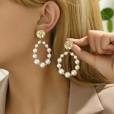 Goldene Statement Ohrringe mit