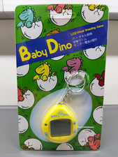 Baby Dino Tamagotchi, mit Original Verpackung, unbespielt, LCD Game - 1997