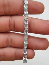 31.95 Karat Blauer Topas &