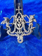 religiöses Ornament Bronze