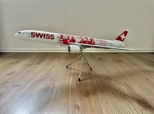 Swiss Boeing 777-300ER Modellflugzeug Maßstab 1:100 Faces Limited Edition Neu