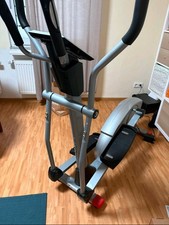 Christopeit CXM 6 Crosstrainer-Ergometer mit Induktionsbremssystem - Silber/Rot.