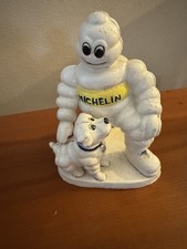 Michelin Mann mit Hund Werbefigur aus Gusseisen