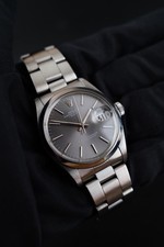 Rolex Oyster Perpetual Date 1500 Papiere LC 100 Grey Rhodium Dial