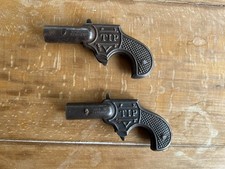 2 x Blech-Spielzeug Knallkorken-Pistole Stöpsel- Kartoffelpistole DRGM-TIP