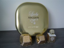 2 Flakons leer, Lady Million von Paco Rabanne, nummerierte Dekodose + Miniatur