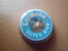Gebrauchter, gold-blauer Kronkorken Gutmann Guter Bier