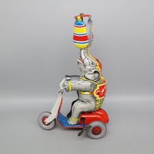 NBN Blechspielzeug Elefant auf Roller [1950er] made in US Zone mech funktioniert